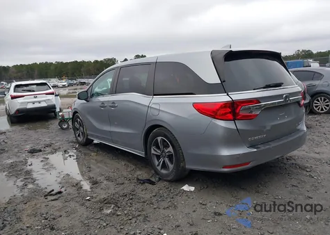 2018 Honda Odyssey Touring from USA, damaged, VIN 5FNRL6H81JB066846